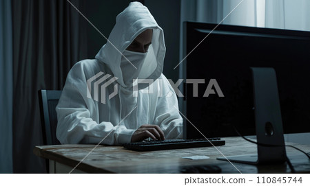 A virologist dressed in a white protective suit 110845744