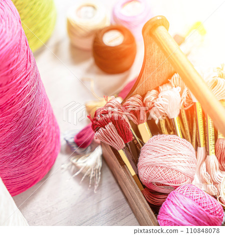 Threads in reels. Colored bobbins for embroidery knitting hobby accessories creativity. 110848078