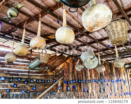 Wall decorated with evil eye nazar, eye-shaped amulet, in Turkey 110848279