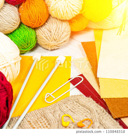 Threads in reels. Colored bobbins for embroidery knitting hobby accessories creativity. Threads in reels. Colored bobbins for embroidery knitting hobby accessories creativity. 110848318