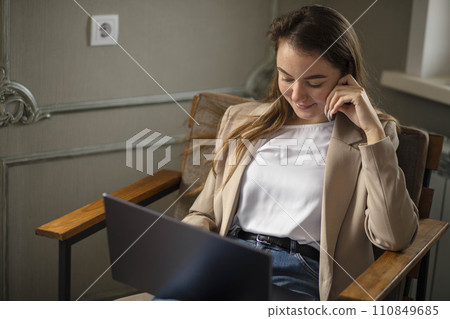 businesswoman using her laptop in office. Small business entrepreneur. Remembers about hydration 110849685