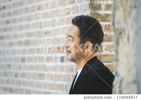 Profile portrait of a man in his mid-50s Profile portrait of a man in his mid-50s 110849817