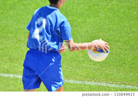 player taking a throw-in player taking a throw-in 110849915