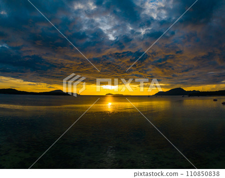 Amazing sunset or sunrise sky over sea landscape,Beautiful colorful light of nature seascape background,Drone aerial view ocean background Amazing sunset or sunrise sky over sea landscape,Beautiful colorful light of nature seascape background,Drone aerial view ocean background 110850838