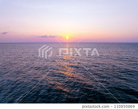 Landscape Sunset sky,Nature beautiful Light Sunset or sunrise over sea,Colorful dramatic majestic scenery sunset Sky with Amazing clouds and waves in sunset sky,Nature light cloud background 110850869