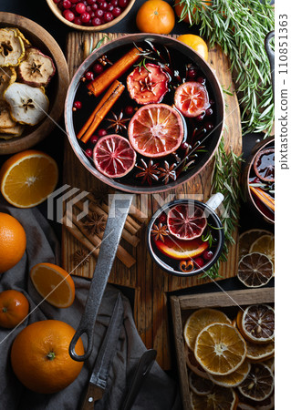 Copper pot of mulled wine 110851363