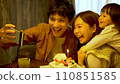 A family taking a selfie to commemorate their birthday 110851585