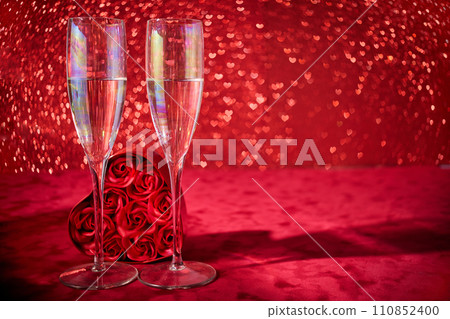 Valentines wine and rose on heart bokeh background 110852400