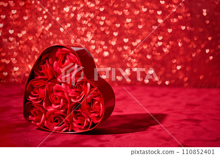 Gift box for Valentine's Day on red background 110852401
