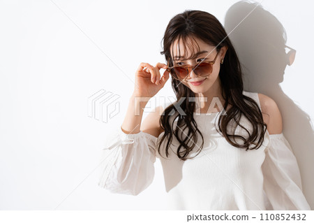 Young woman with vacation look Young woman with vacation look 110852432