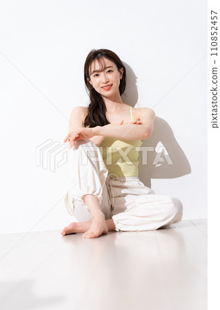 young woman in sportswear young woman in sportswear 110852457