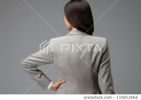 AI-generated content. female hands photorealistic The back of a Japanese business woman points her finger Generative AI 110852668