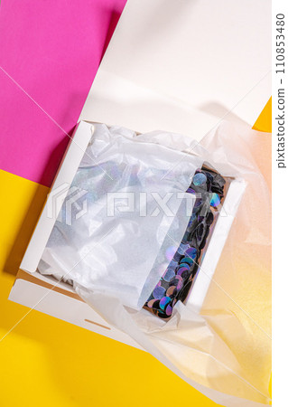Simple white cardboard box on color background, top view 110853480
