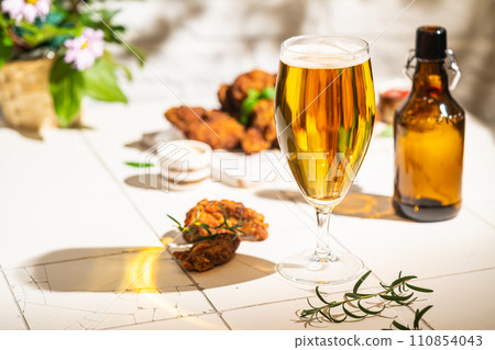 Glass of light beer Glass of light beer 110854043