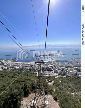 A view of a city from a cable car in Gibraltar 110854089