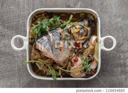 Thai-Chinese style Steamed Salmon with Soy Sauce and Ginger. Thai-Chinese style Steamed Salmon with Soy Sauce and Ginger. 110854885
