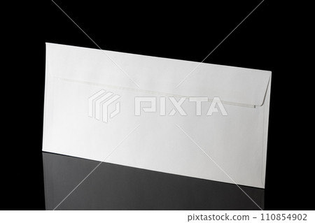 White craft envelope isolated on black background White craft envelope isolated on black background 110854902