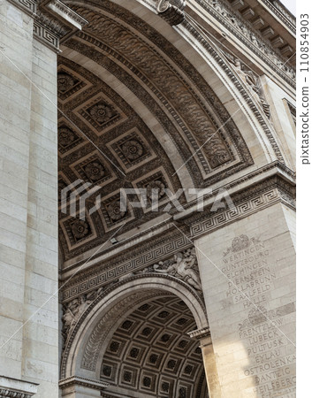 Detail under view of carvings under the arch of the Triumphal Arch. 110854903