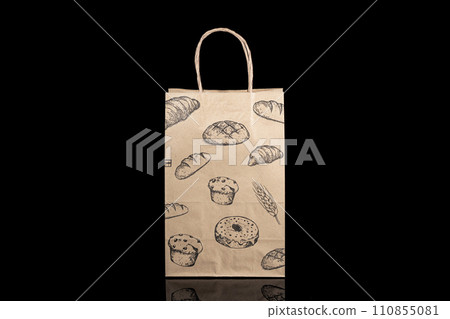 Recyclable craft paper bag for purchases, gifts and takeaway food mock up on black background. Environmentally friendly than single-use plastic bags Recyclable craft paper bag for purchases, gifts and takeaway food mock up on black background. Environmentally friendly than single-use plastic bags 110855081