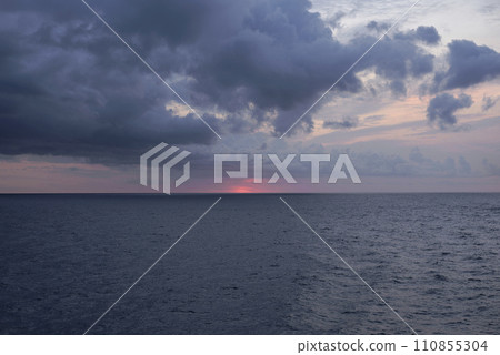 Sunset over the mediterranean sea on a cloudy day Sunset over the mediterranean sea on a cloudy day 110855304