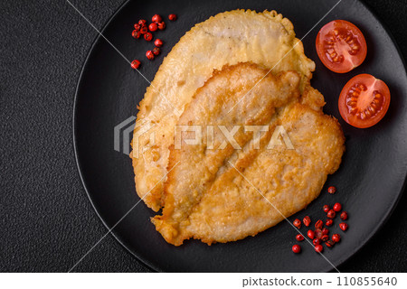 Delicious battered chicken breast chops with salt, spices and herbs Delicious battered chicken breast chops with salt, spices and herbs 110855640