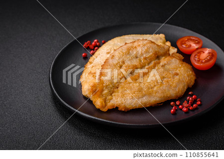 Delicious battered chicken breast chops with salt, spices and herbs Delicious battered chicken breast chops with salt, spices and herbs 110855641