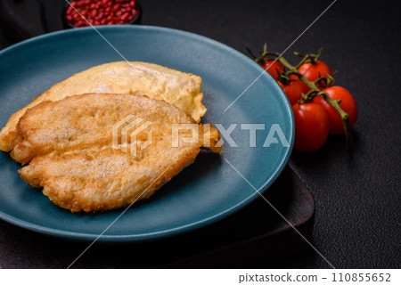 Delicious battered chicken breast chops with salt, spices and herbs 110855652