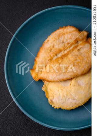 Delicious battered chicken breast chops with salt, spices and herbs 110855655