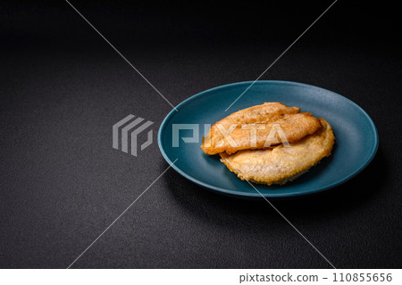 Delicious battered chicken breast chops with salt, spices and herbs 110855656