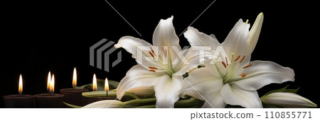 White lilies and burning candles 110855771