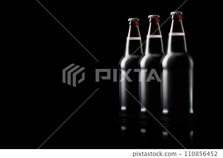 Set of Beer bottle on a black background. Bottle with drink like Ipa, Pale Ale, Pilsner, Porter or Stout 110856452