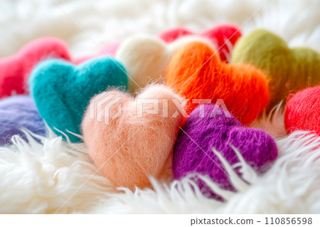 Poster or banner of colorful yarn hearts on surface on a blue background, Vibe of st. Valentine day and romantic 110856598