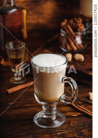 Irish coffee in drinking glass Irish coffee in drinking glass 110857428