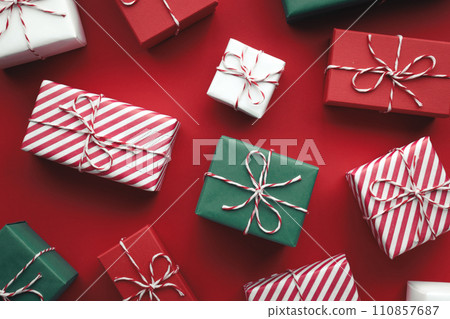 Color gift boxes on color background, flat lay Color gift boxes on color background, flat lay 110857687