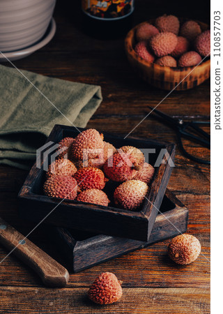 Lychees in Small Wooden Tray 110857703