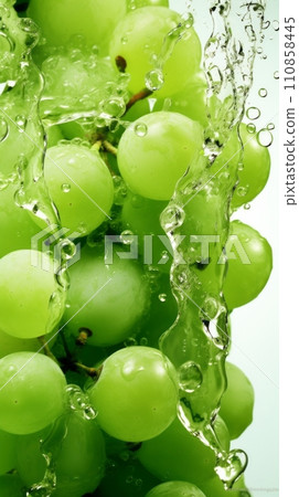 Green grapes in a splash of water and grape juice on a white background 110858445