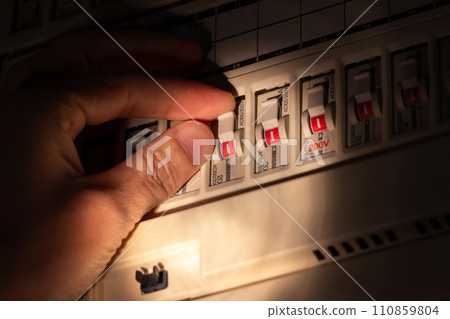 breaker switch illuminated by light 110859804