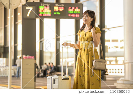 Airport arrival bus stop female Airport arrival bus stop female 110860053