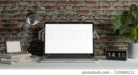 Minimalist workspace with a laptop mockup on a table in a minimal office. 3d render illustration Minimalist workspace with a laptop mockup on a table in a minimal office. 3d render illustration 110860212