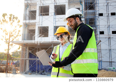 Team of architect or engineer looking laptop for inspection and planning construction. 110860979