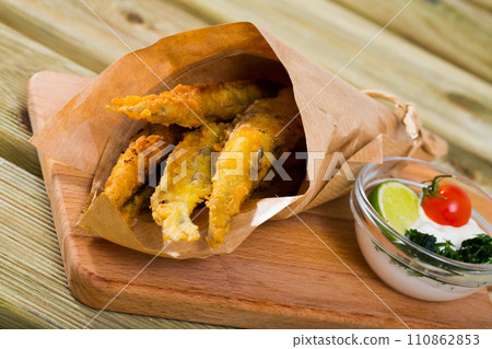 Fish Chips - fried tempura sardines 110862853