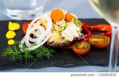 Chicken salad on ring of roasted eggplant 110862910
