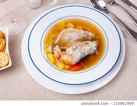 Fresh fish stock made of salmon carcass Fresh fish stock made of salmon carcass 110862999