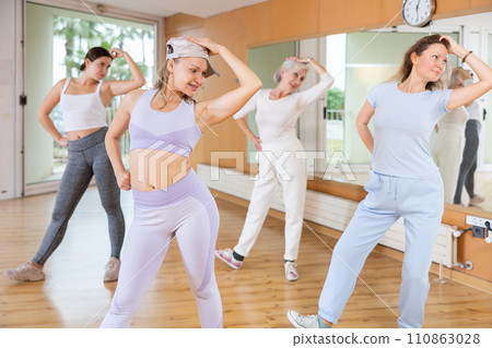 Dance group teaches hip hop dance in dance studio Dance group teaches hip hop dance in dance studio 110863028