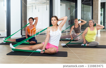 Group of women doing stretch exercises 110863471