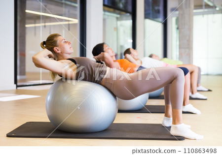 Sports women is training cross fitness with pilates balls 110863498