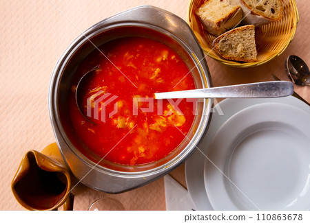 Food callos with chickpeas, pepper and beef tripe, served in bowl Food callos with chickpeas, pepper and beef tripe, served in bowl 110863678
