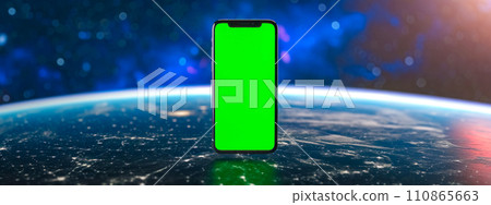 AI-generated content. smartphone with a green screen in the foreground, set against a backdrop of a highly detailed, illuminated Earth from space, with bokeh light effects enhancing the cosmic 110865663