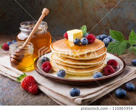 Pancakes with berries and butter "AI generated image" Pancakes with berries and butter "AI generated image" 110865954
