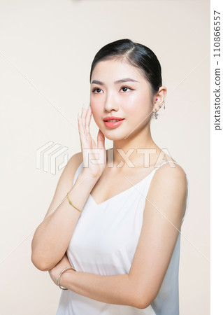 Skin care.Woman with beauty face touching healthy facial skin portrait.Asian woman. 110866557